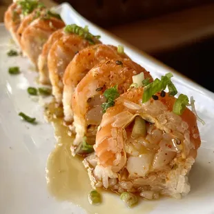 First Lady Roll - Spicy scallop, cucumber, salmon, green onion, chili oil