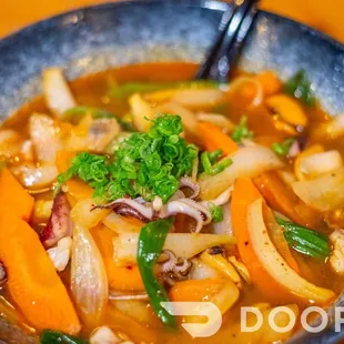 a bowl of soup on a table