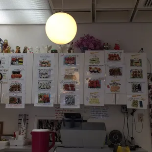a kitchen with a lot of food on the wall