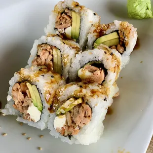three pieces of sushi on a plate