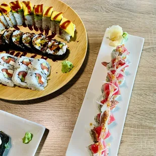 various types of sushi on a plate