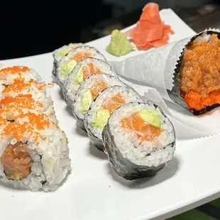 a plate of sushi rolls on a table