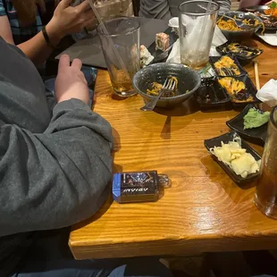 Two people at end of table
