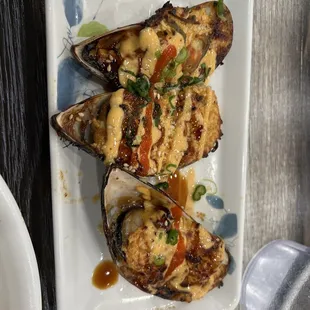 a plate of stuffed mussels