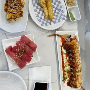 baked roll, calamari, tuna pieces, not sure the other roll