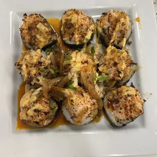 Volcano roll ( Miguel style) if you don't like spicy food then stay away from Miguel style. Just order it normal.