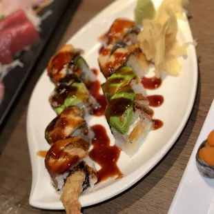 a plate of sushi on a table