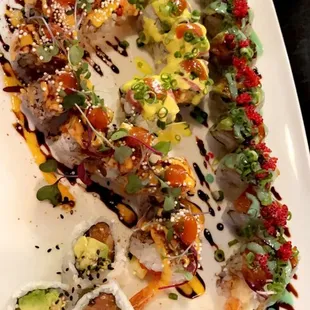 4 rolls of sushi $16 per roll  Over $75 plate after tax and tips