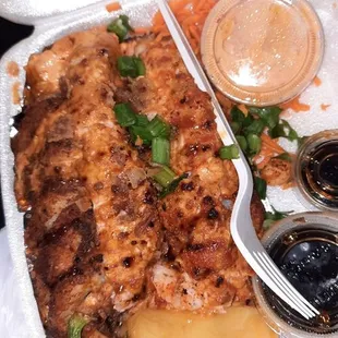 an open takeout box of food