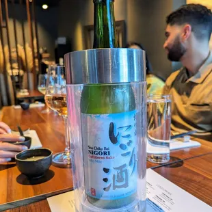 Large Sho Chiku Bai Nigori Unfiltered Sake. 750 mL bottle for $33. "Silky mild" and creamy.