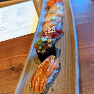 Nigiri Omakase. $45. Includes miso soup, chef's choice of 8 pieces nigiri, hand roll, tamago. See my review for description of each nigiri.