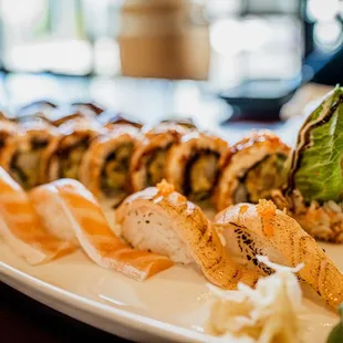 Sake toro nigiri, seared salmon nigiri, and house special roll