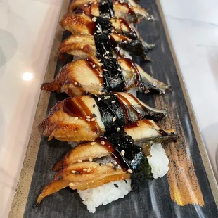 a close up of a plate of sushi