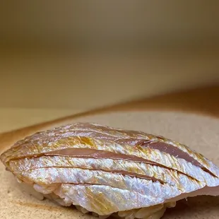 a piece of fish on a plate