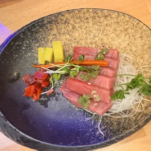 Bluefin tuna carpaccio we order but wasn't platted as shown in the image on the menu