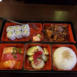 a bento box of food