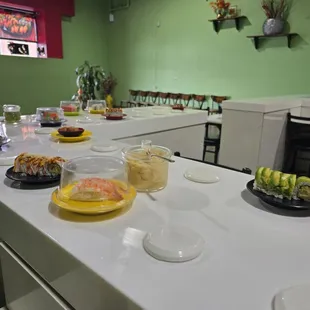 Wish all of the sushi was covered as it passed by everyone