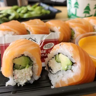 a plate of sushi rolls