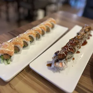two plates of sushi on a table