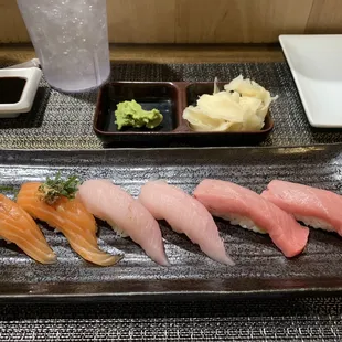 Salmon nigiri special. Yellowtail nigiri. Toro nigiri.