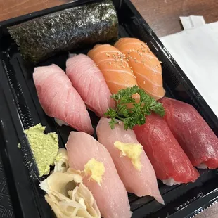 Yellowtail, Salmon, albacore, tuna. All included in the 8 Sushi with 1 Roll
