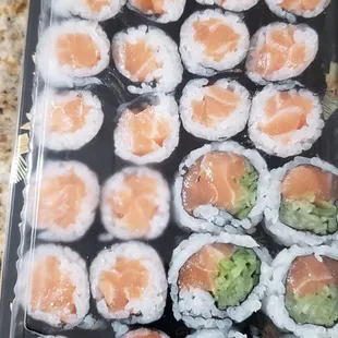 It was supposed to be spicy salmon. Guessing just regular salmon rolls.