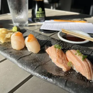 a plate of sushi on a table