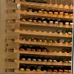 a rack of wine bottles