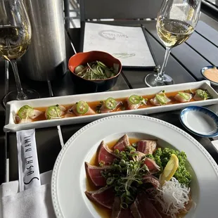 Tuna tataki, seared tuna in ponzu sauce and the flounder with jalapeños(not spicy). Cucumber Salad- very fresh.