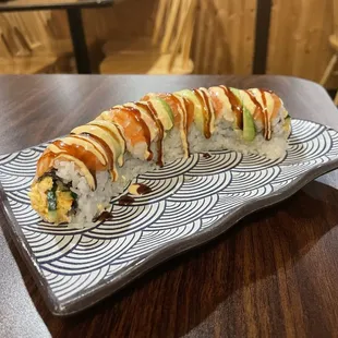 a plate of sushi on a table