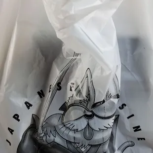 a bag of sushi neko