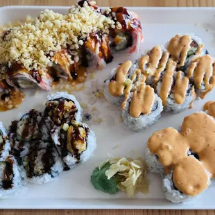 Clockwise from top L: Fire Cracker Roll, Spicy Tuna Roll, Spicy California Roll (6pc), Shrimp Tempura Roll