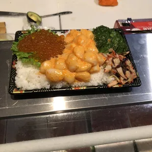 Special order Chirashi Don with spicy scallops and salmon roe.