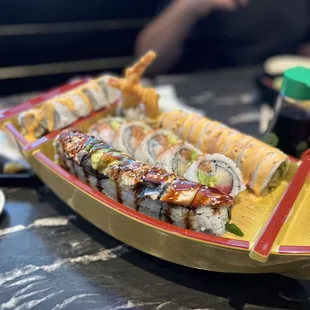 a plate of sushi on a table