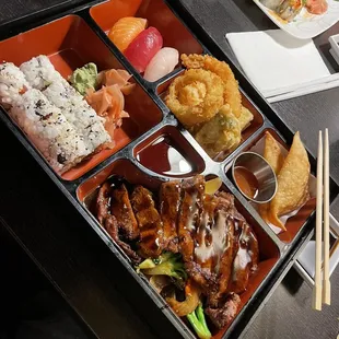 Dinner bento box: three pieces of nigiri, tempura veggies, crab Rangoon, sushi roll and beef teriyaki