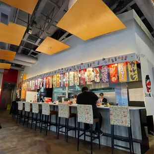 the interior of a sushi restaurant