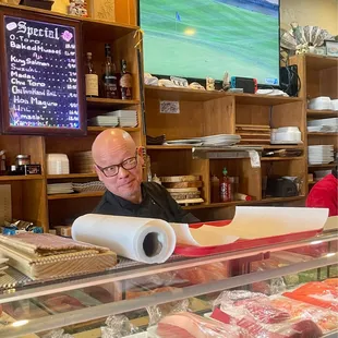 Hirosan working at the sushi bar