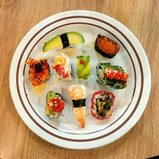 Avocado, salmon roe, scarlet roe salmon,(?), caterpillar roll, tuna &amp; salmon roll, shrimp &amp; fake crab, cooked shrimp and shrimp tempura.
