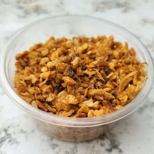 Side dish of deep fried diced garlic which you can sprinkle onto everything. Yum!