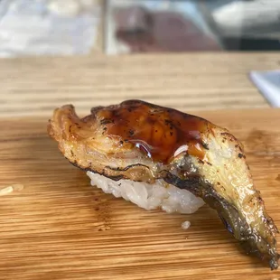 a close up of a piece of sushi