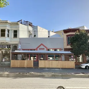 a view of a restaurant from across the street