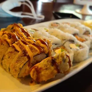 a plate of sushi on a table