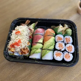 L to R. Monster roll, rainbow roll, salmon roll. Favorite sushi spot! To go only still as of 5/2021