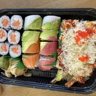 L to R: salmon roll, rainbow roll (fiancé&apos;s favorite), monster roll (my favorite)