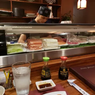 The Sushi Chef Ming and some of the Sushi and Sashimi offerings.