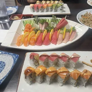 911, Playboy, Rainbow, New York rolls w/ 15 pc sashimi &amp; nigiri. Delicious!