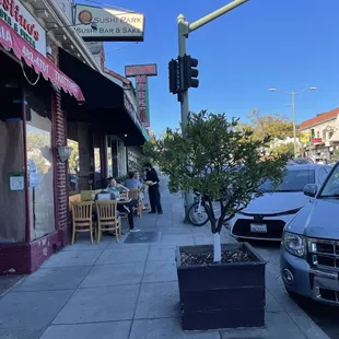 a street corner with parked cars