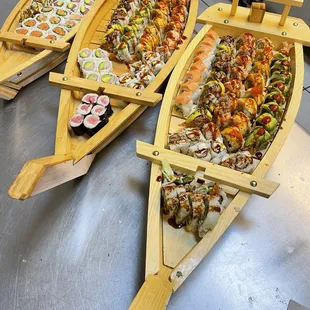 All you can eat sushi , signature rolls , appetizers on a boat