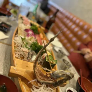 a table with a variety of sushi