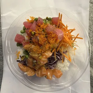 Poke Bowl with 2 Mix Protein on an 8.5&quot; x 11&quot; piece of paper, for perspective.